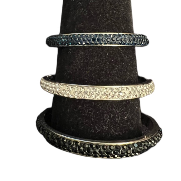 Set of three sliver and Crystal bangle bracelets. One each clear, black, blue. - Picture 2 of 2